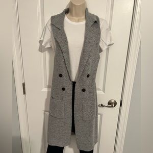 Cardigan/Vest nearly new. Only worn once.